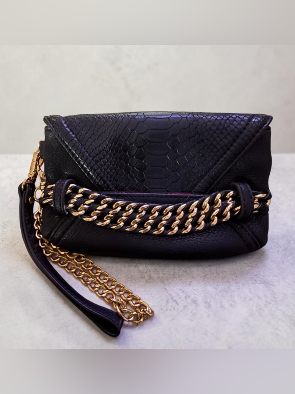 Vintage Cache black snakeskin gold chain detail cutch/wristlet